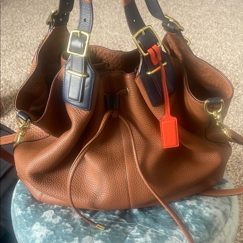 Coach Brown Leather slouchy bag with Gold Accents.